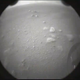 The second image transmitted to Earth after the landing, with the rover’s wheel visible at right.